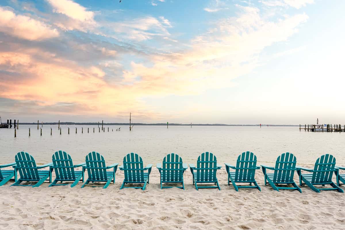 a row of chairs with an oceanfront view