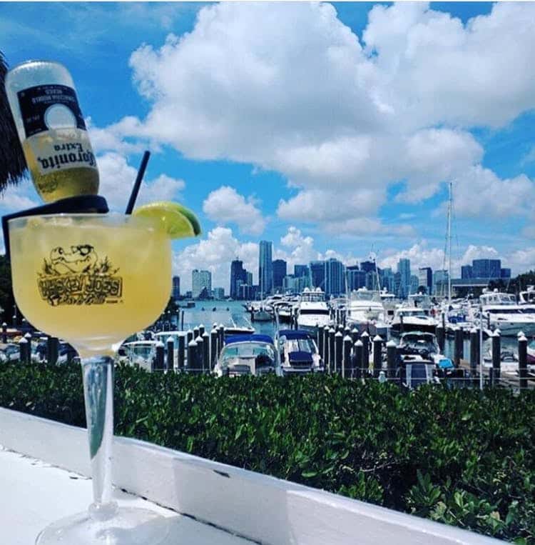 a margarita with a view of the water