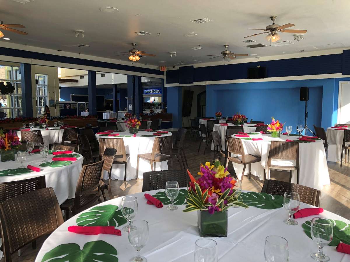 a special events room decorated with a tropical theme