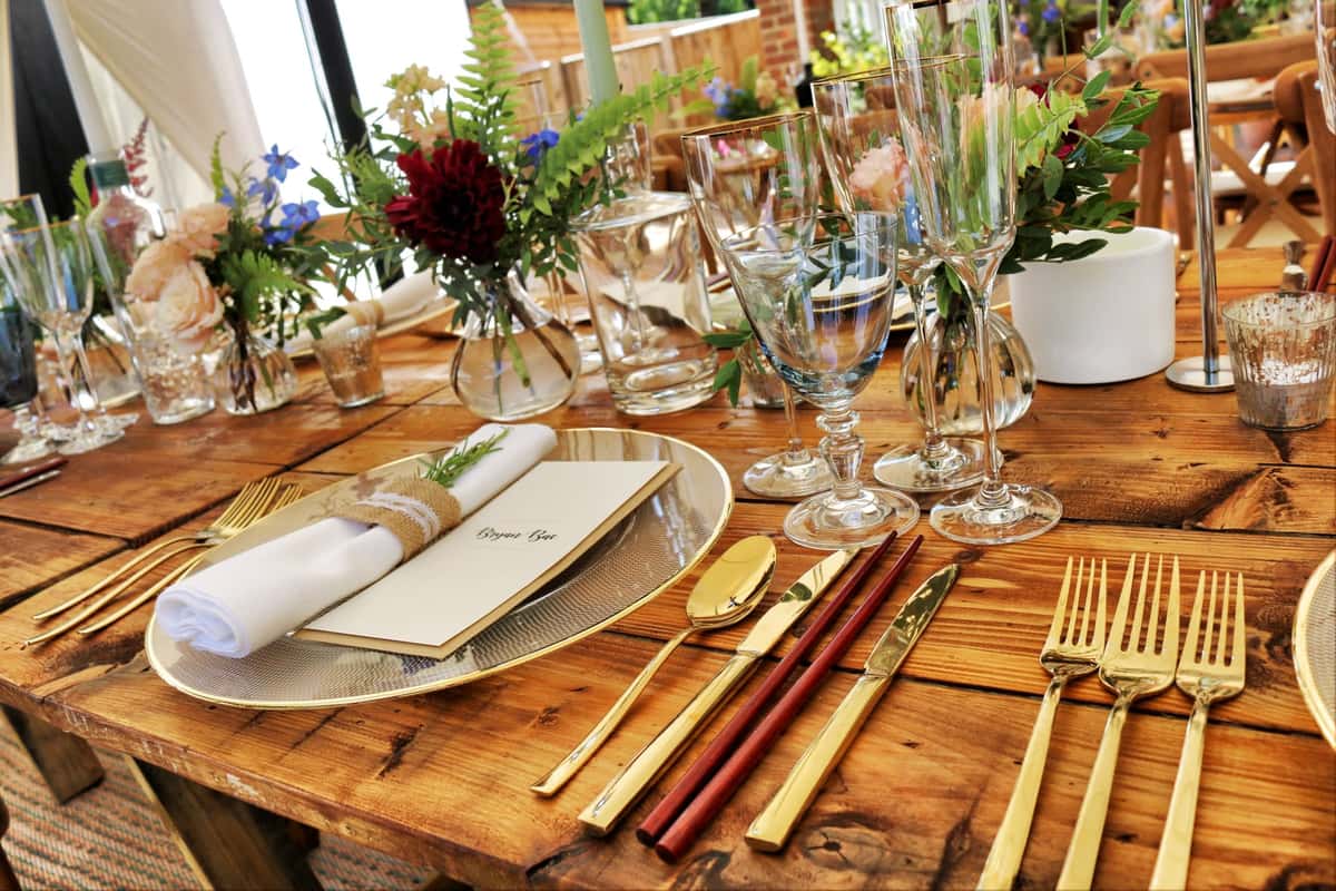 Decorated table with dinner plate and silverware