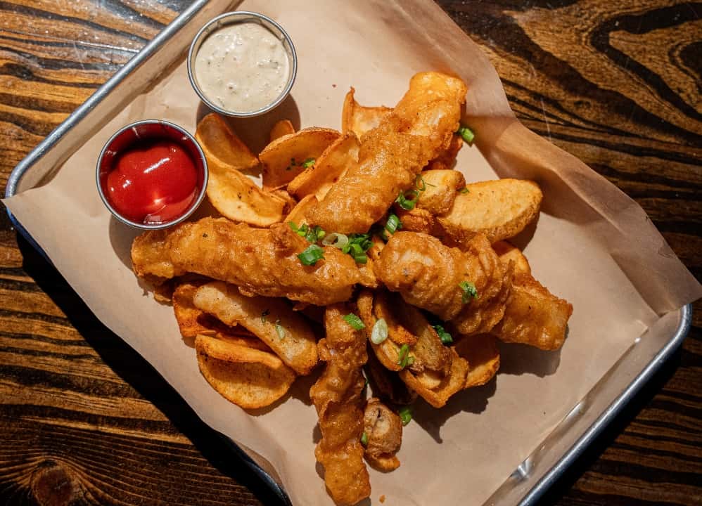 Fish & Chips with our homemade tarter sauce and house fries