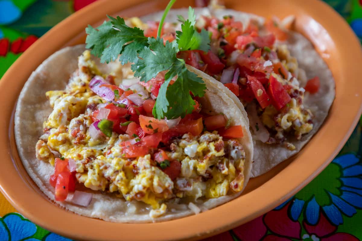 Scrambled eggs and bacon tacos