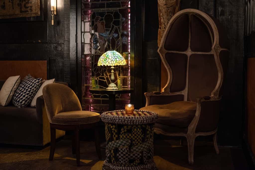 Interior lounge style dining of Seymour's with a dark lit ambient environment