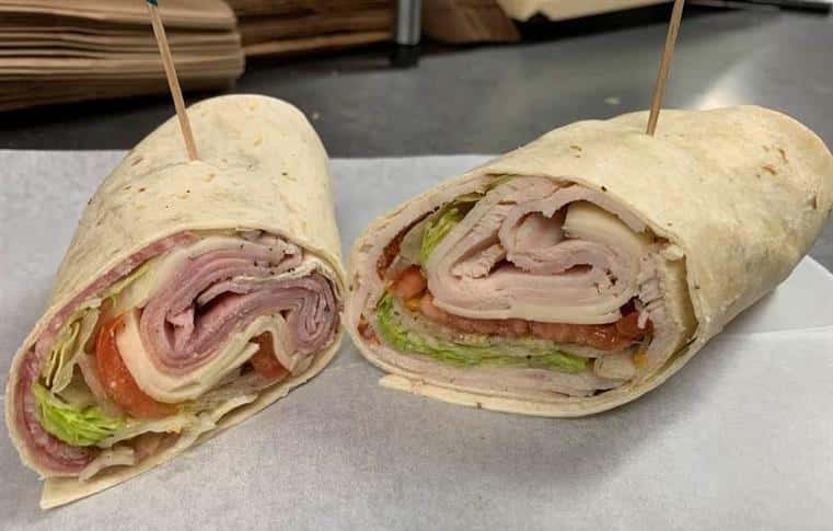 open faced wrap with meats, cheese, lettuce, tomato