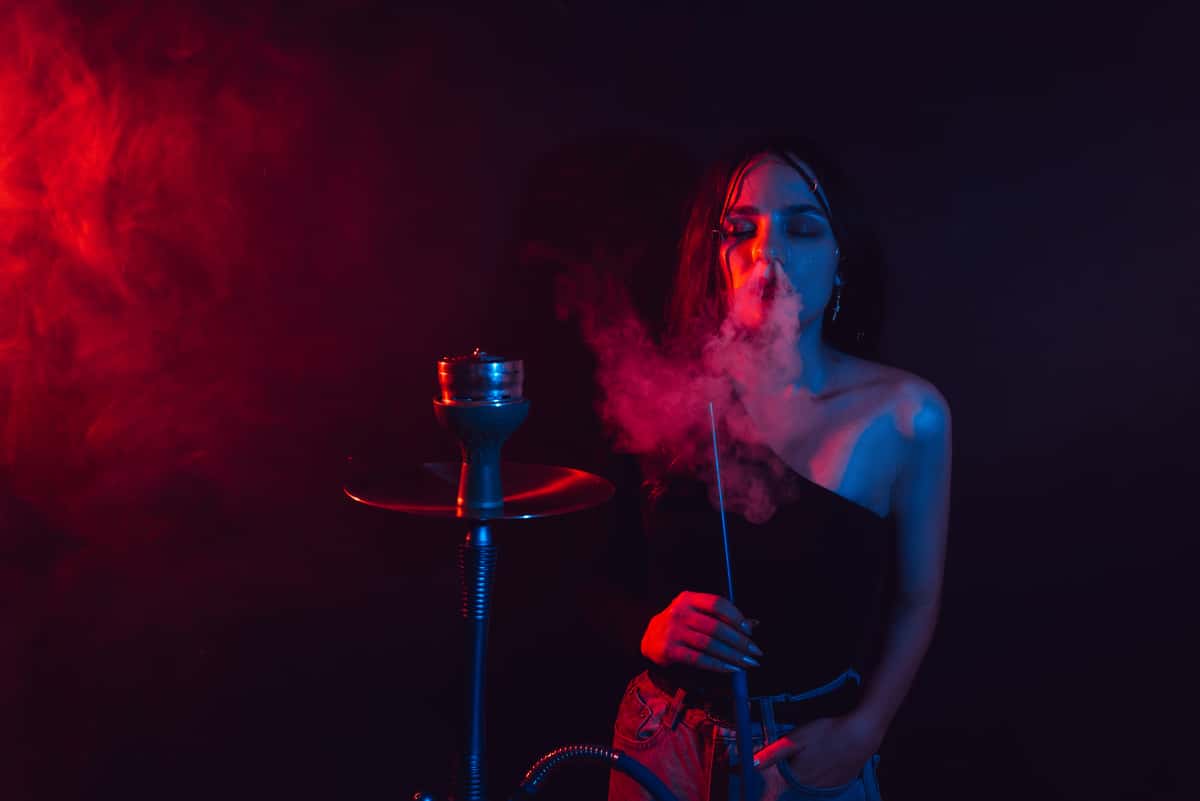 A girl smoking a hookah