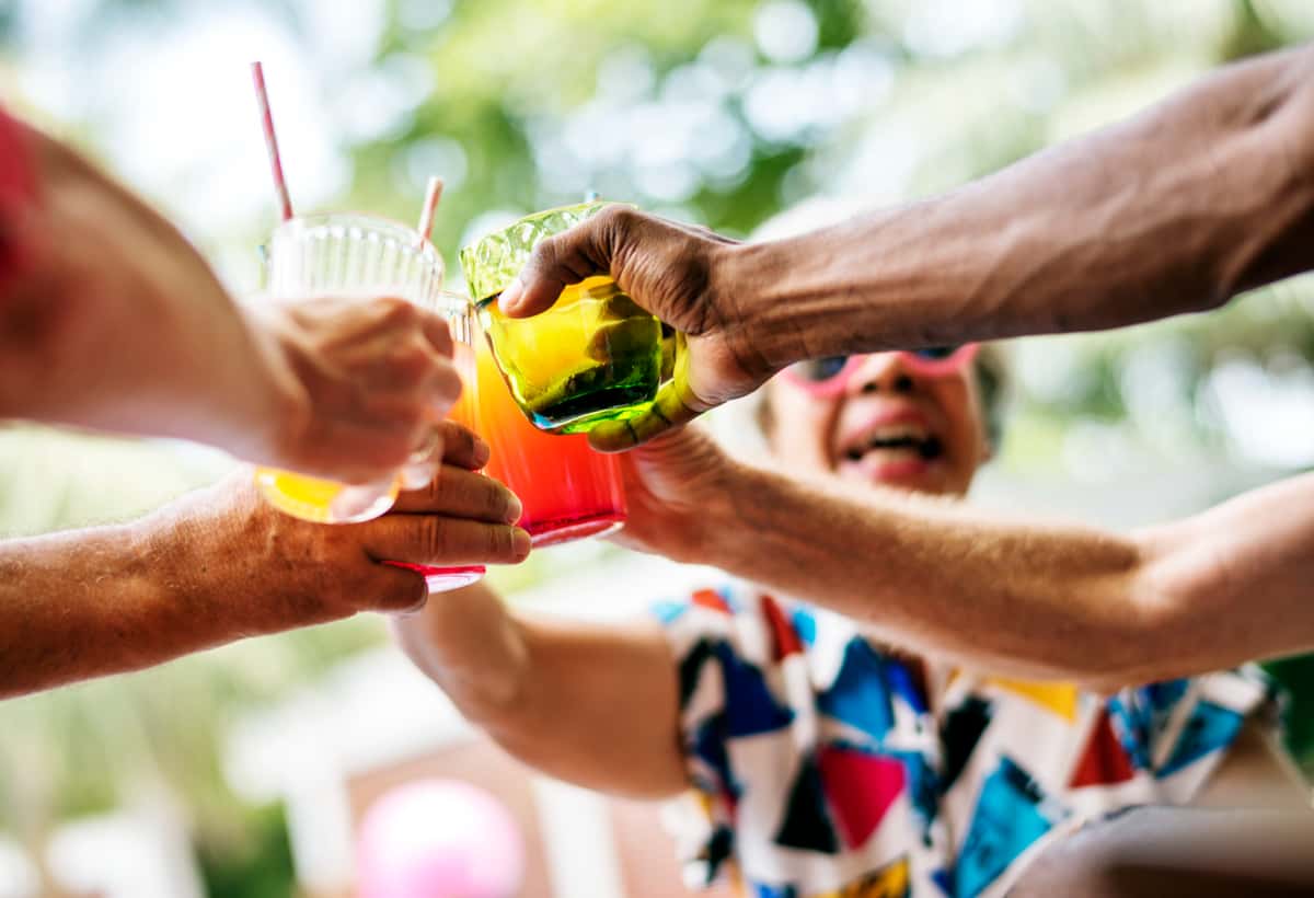 Group of people toasting cocktails