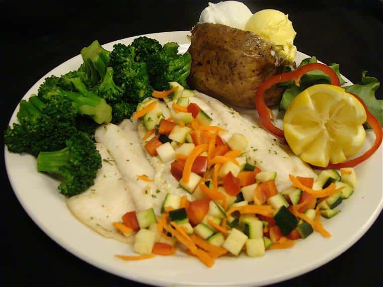 entree with a baked potato and broccoli