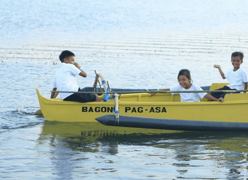Yellow Boat of Hope - Kids in Yellow Boat