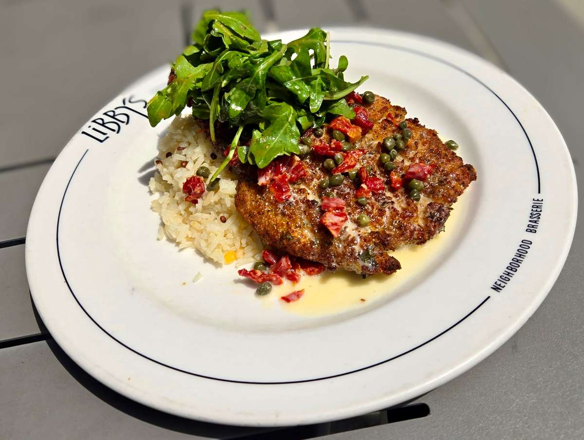 herb-crusted pan seared chicken breast, jasmine rice, lemon butter white wine reduction, sun-dried tomatoes, capers, balsamic vinaigrette arugula salad