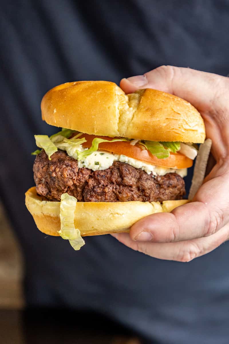holding boursin burger