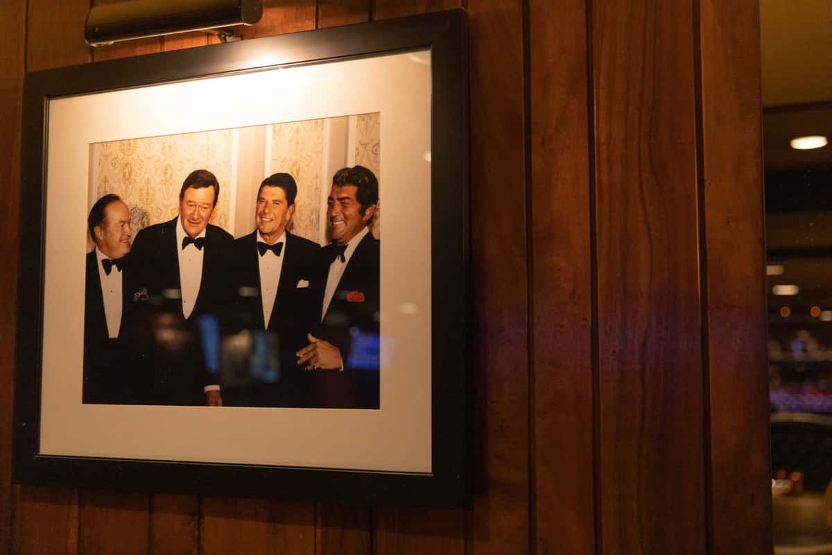 interior photo of four men