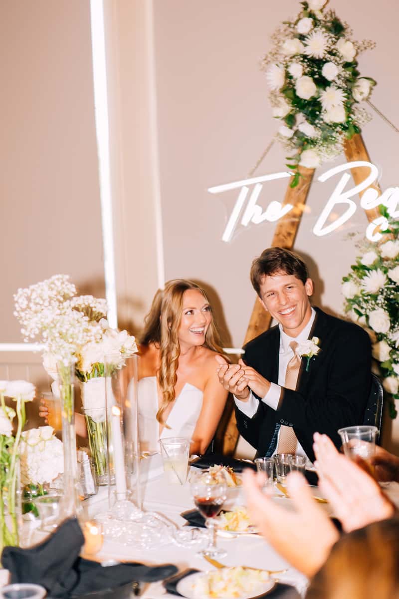 Photo of bride and groom smiling