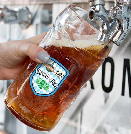 Down Town Oktoberfest Beer mug being filled with beer from tap