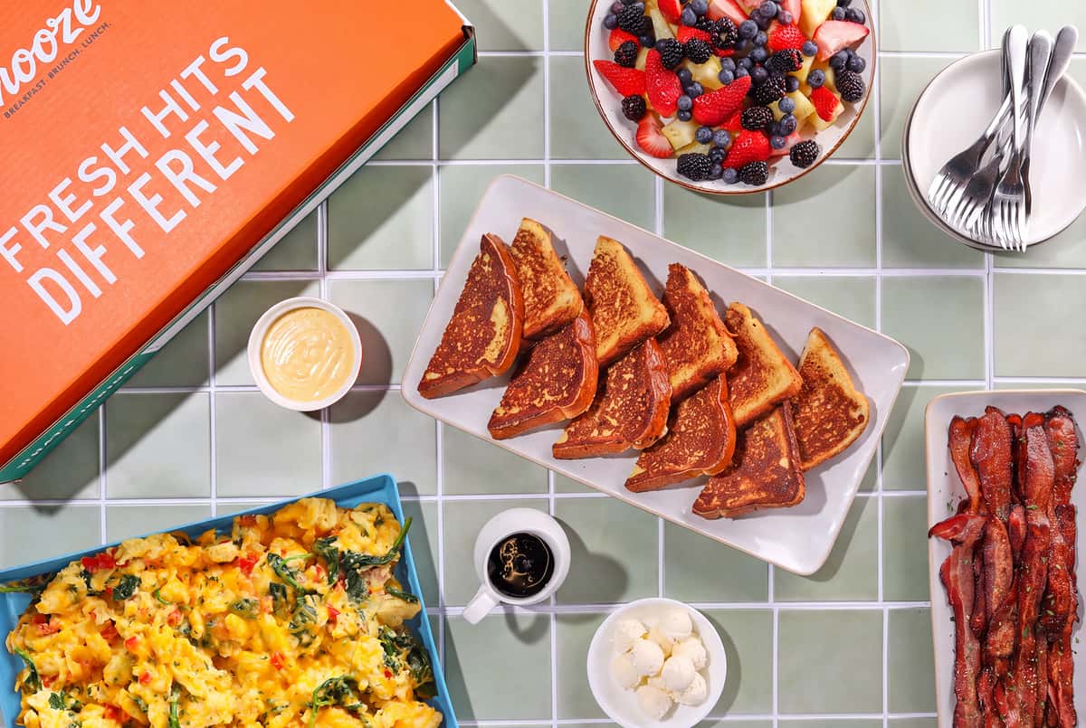 Snooze Table for 10 breakfast catering package with French toast, fresh berries and breakfast sides