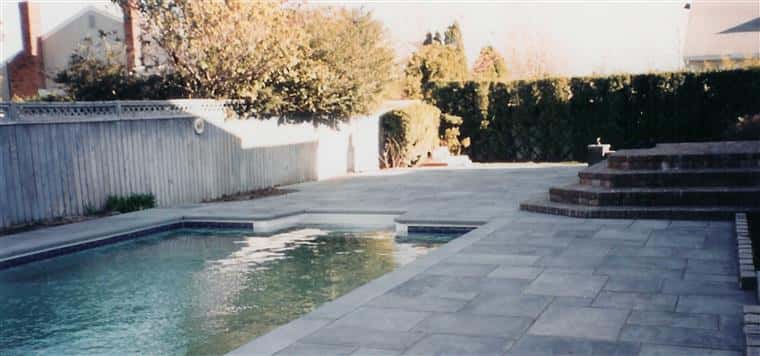 outside patio area of backyard with pool