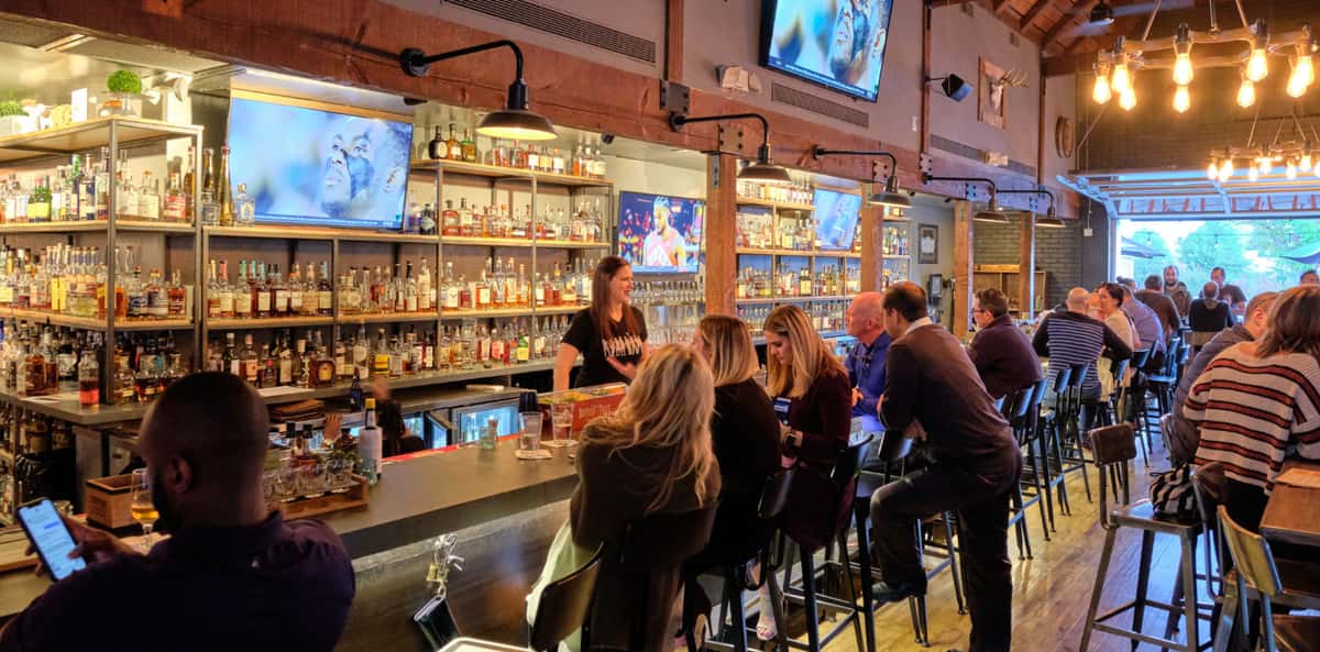 guests dining at bar area