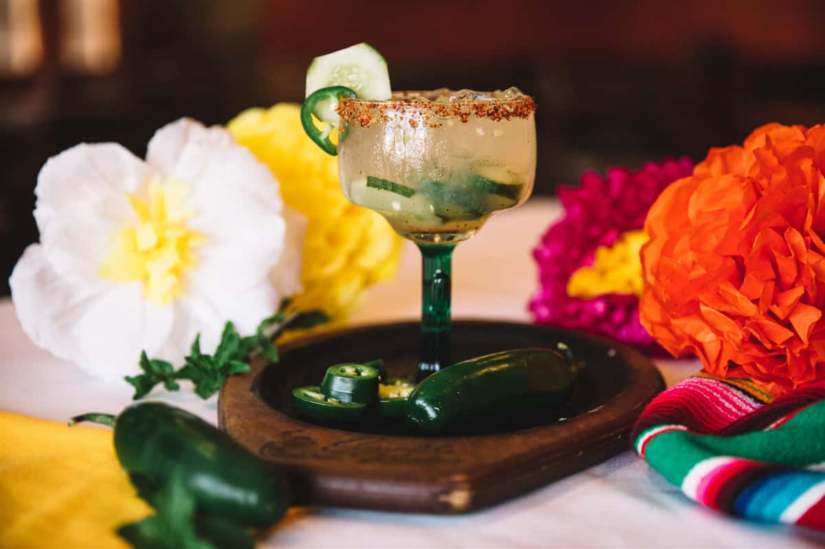 margarita with flowers on the side as decoration