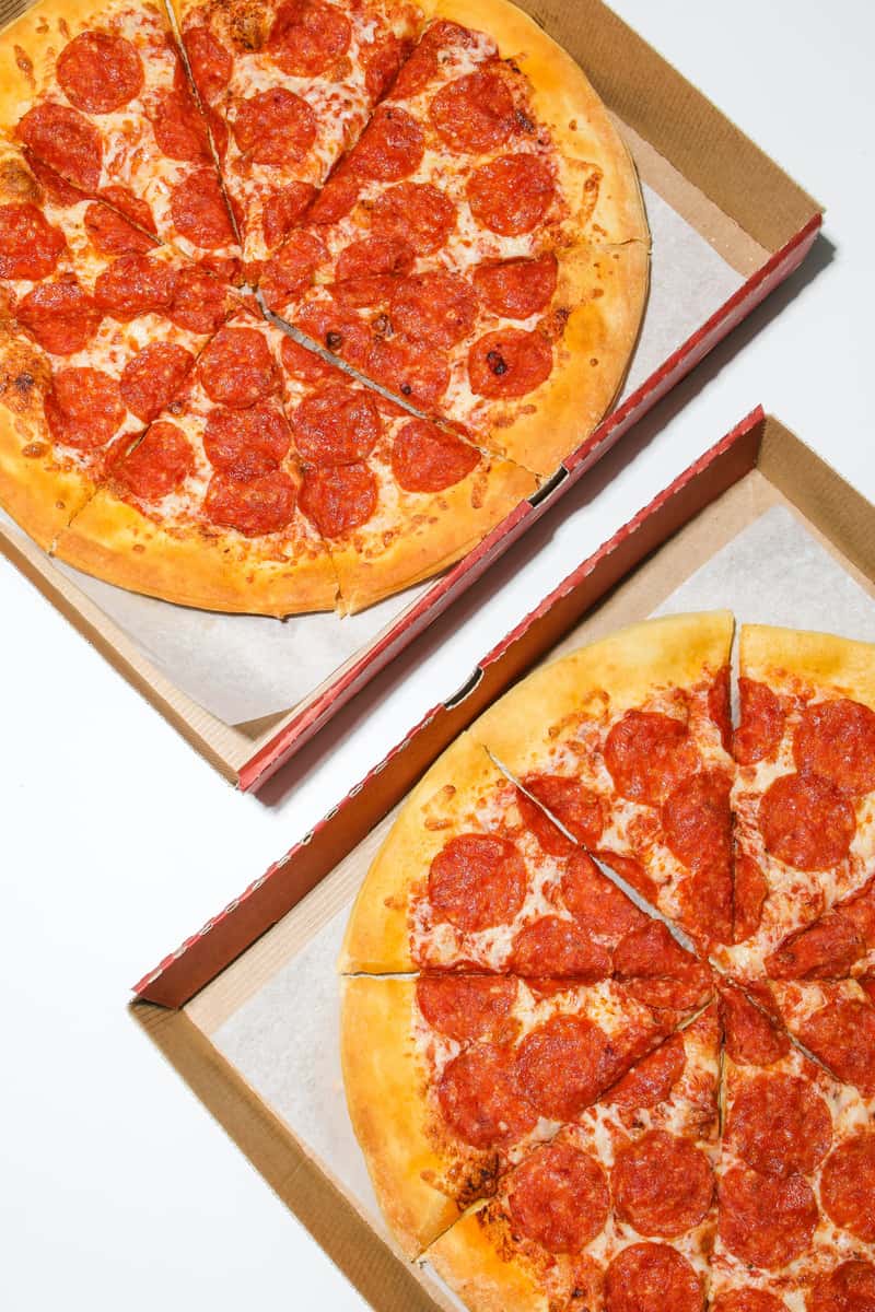 pepperoni pizza in boxes