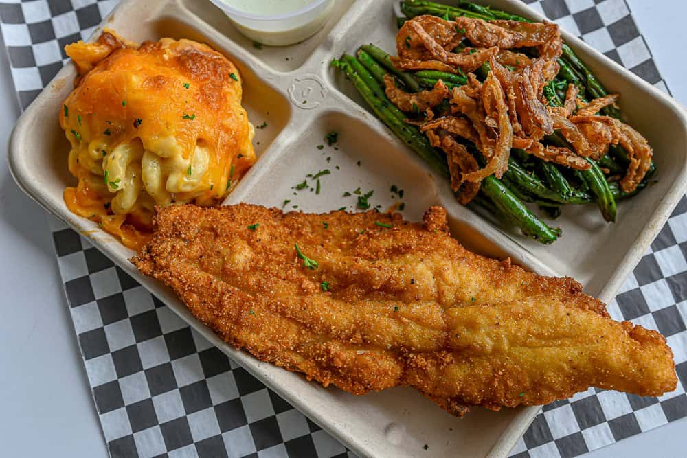 fried catfish dinner with green beans and mac and cheese