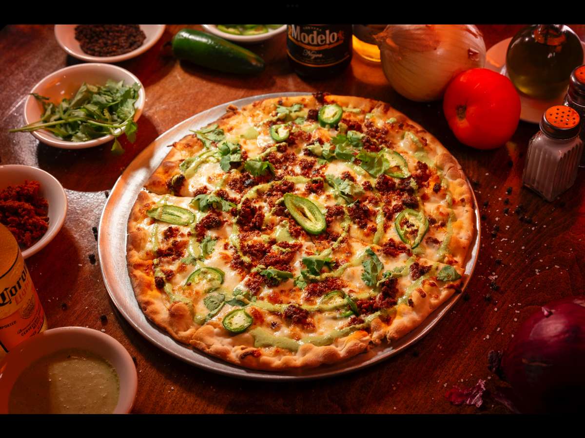 Chorizo, tomato, onion, jalapenos, fresh cilantro
and cilantro crema drizzle