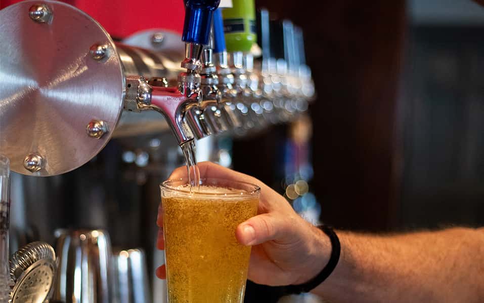 Beer being poured from a tap