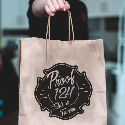 Takeout bag from Proof 124 restaurant