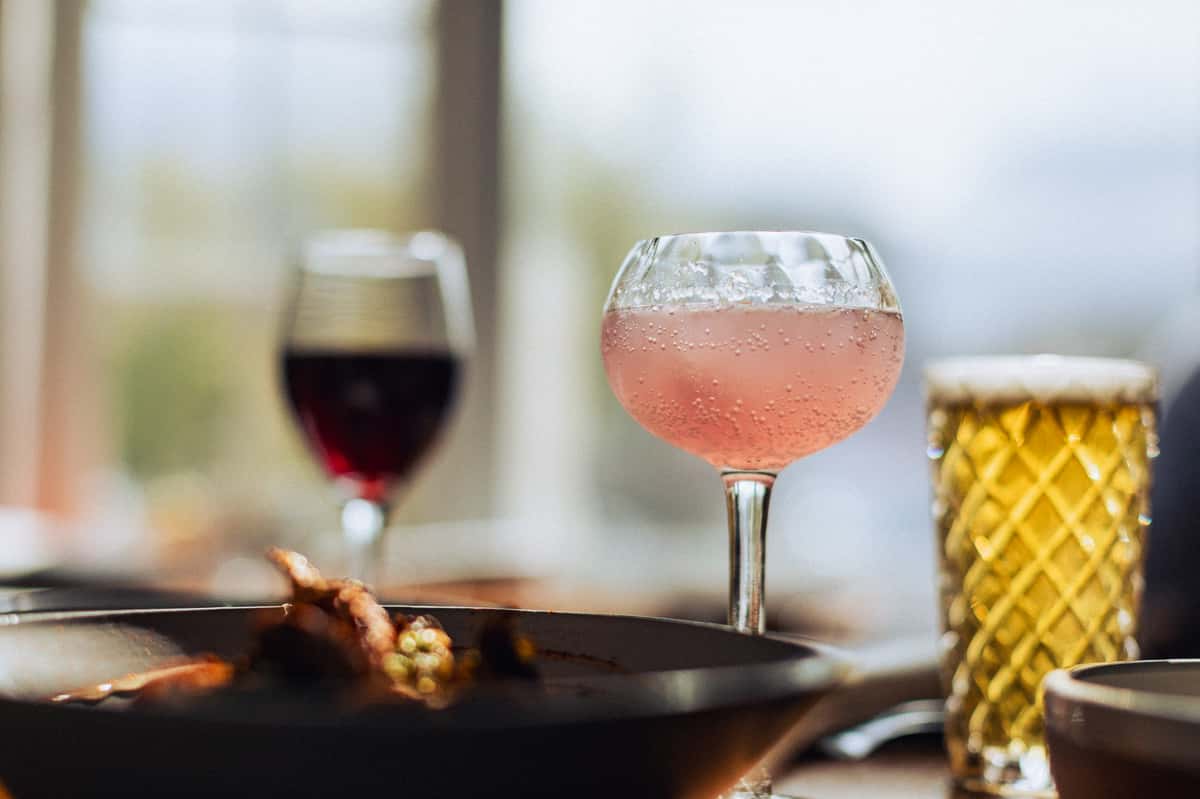 Wine glasses sitting on a table