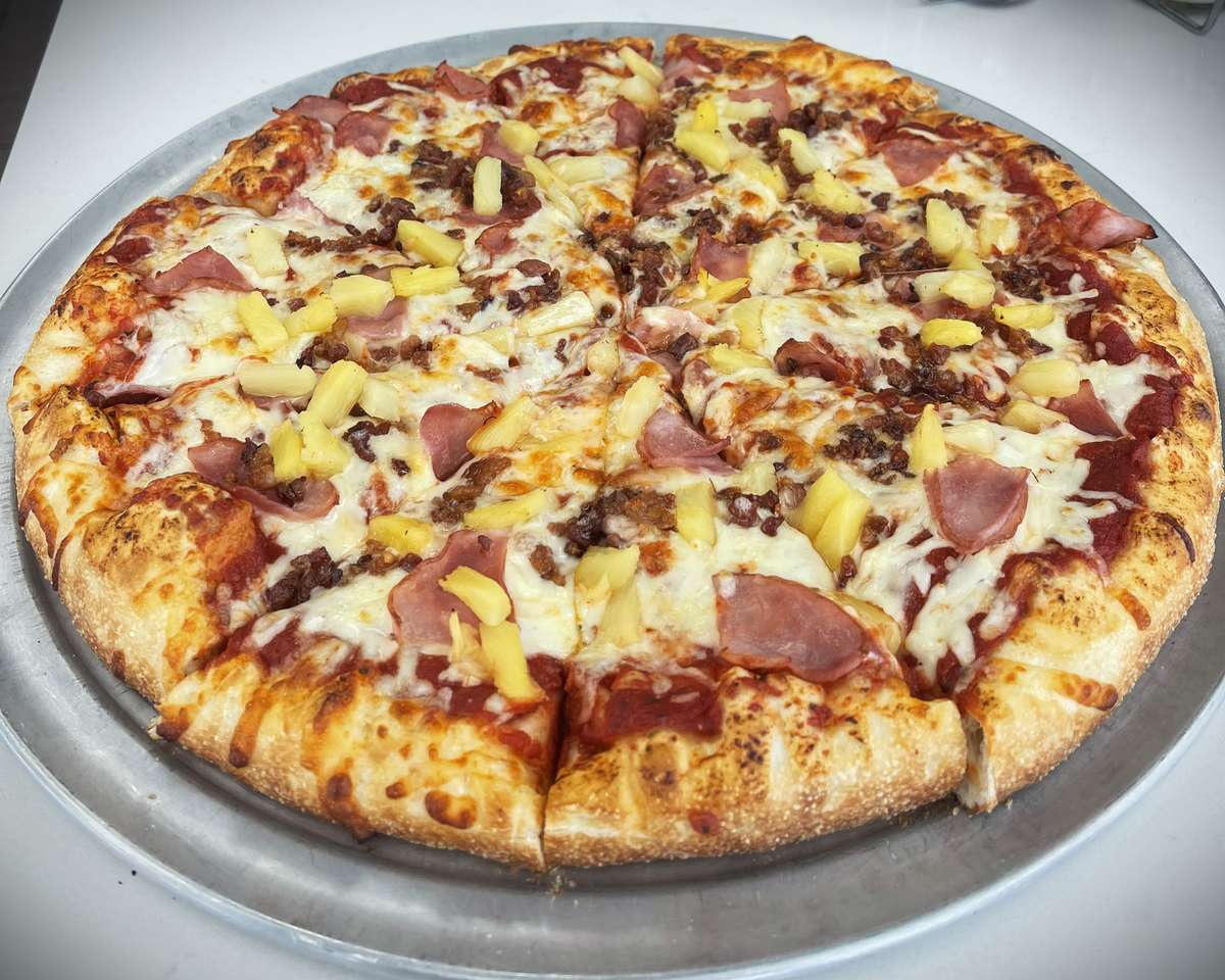 Pineapple, crisp bacon, ham and our 3 cheese blend