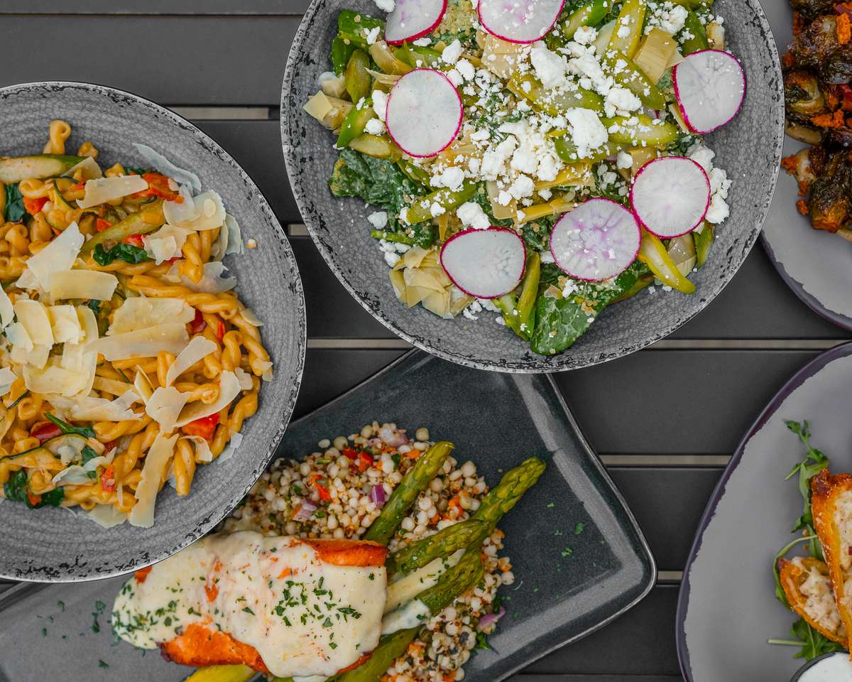 Various Food Items from the Spring Menu at Coughlin's Law Kitchen and Alehouse; Restaurant in Mount Washington Pittsburgh with a View of Downtown