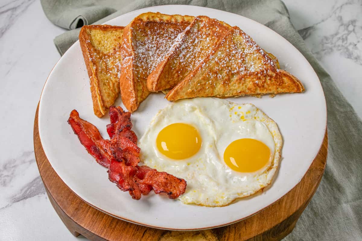 2 pancakes or French toast, 2 eggs, 2 bacon
