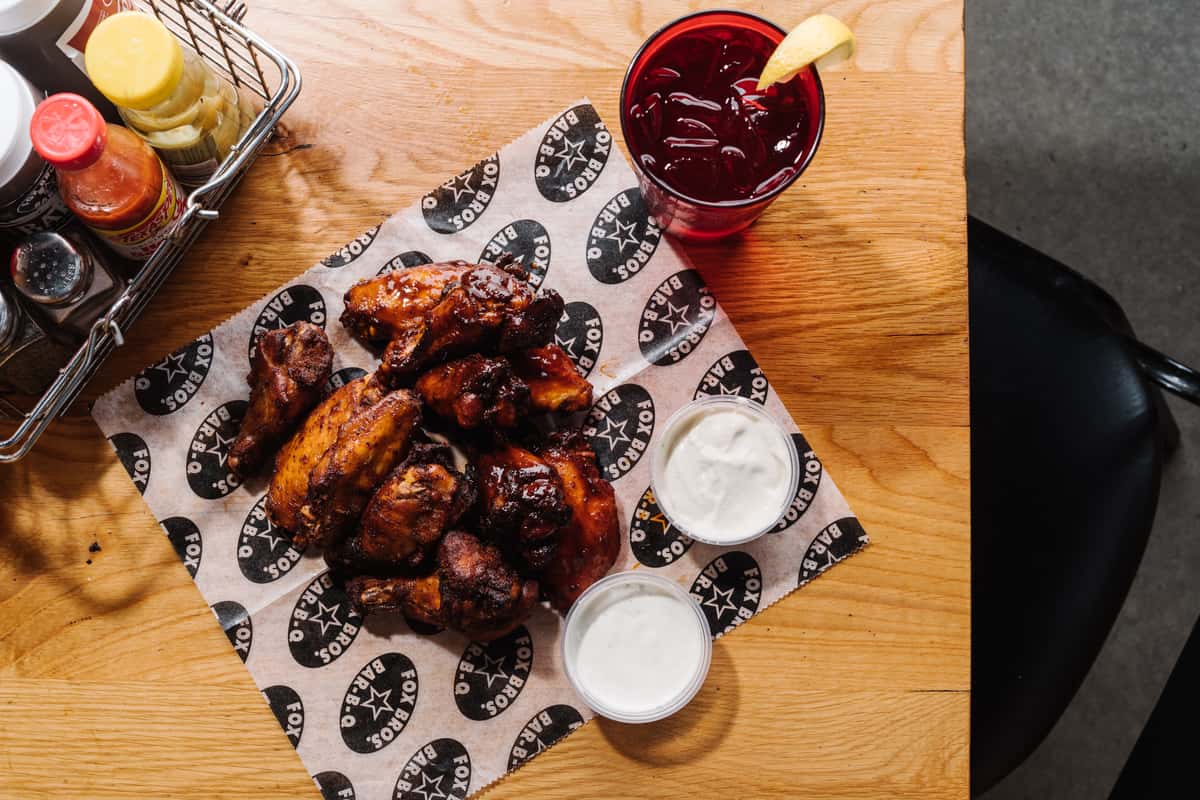 Hickory smoked jumbo wings tossed in homemade wing sauce; served with ranch or blue cheese