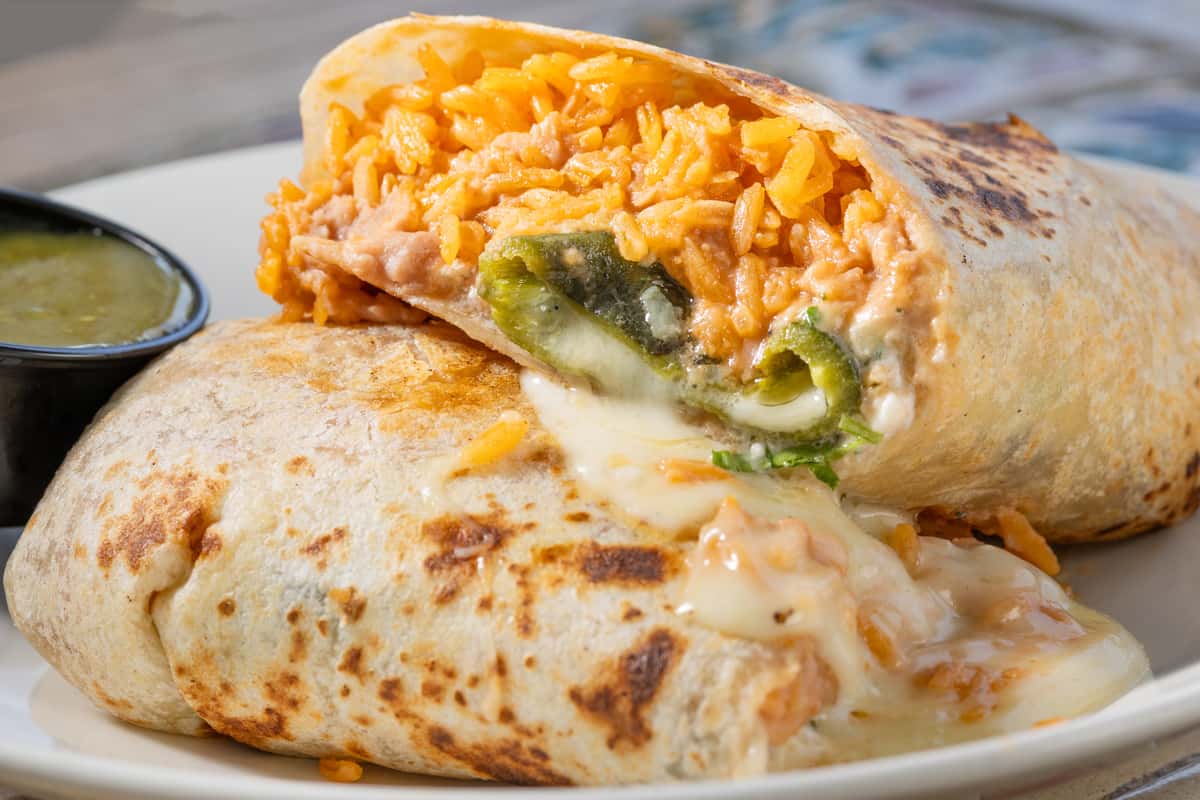 Close up of cut open Chile Relleno Burrito