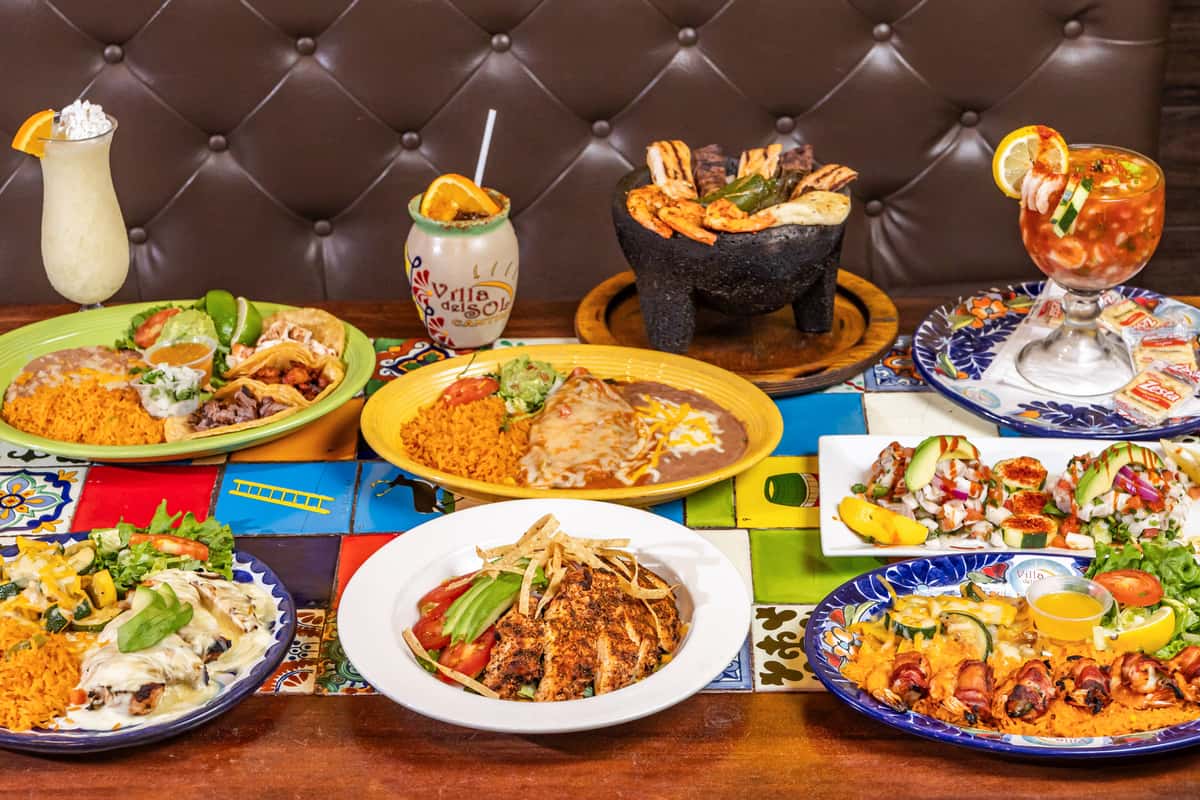 Food spread including Mexican dishes