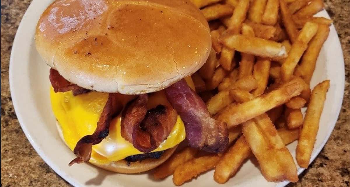 Hamburger with bacon and fries