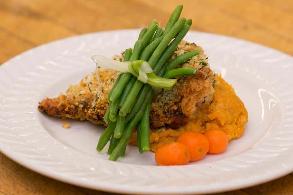 breaded chicken with green beans and mashed sweet potatoes