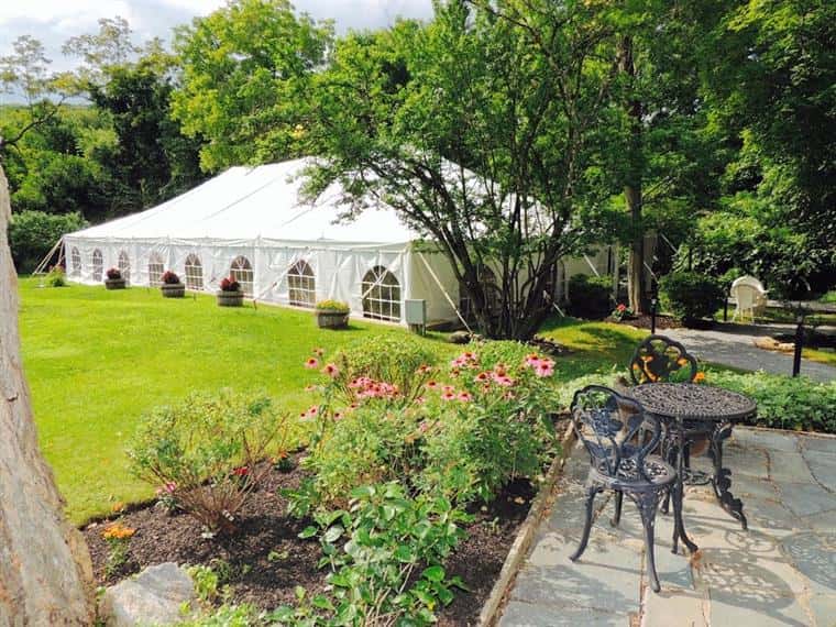 tent with walls on a lawn