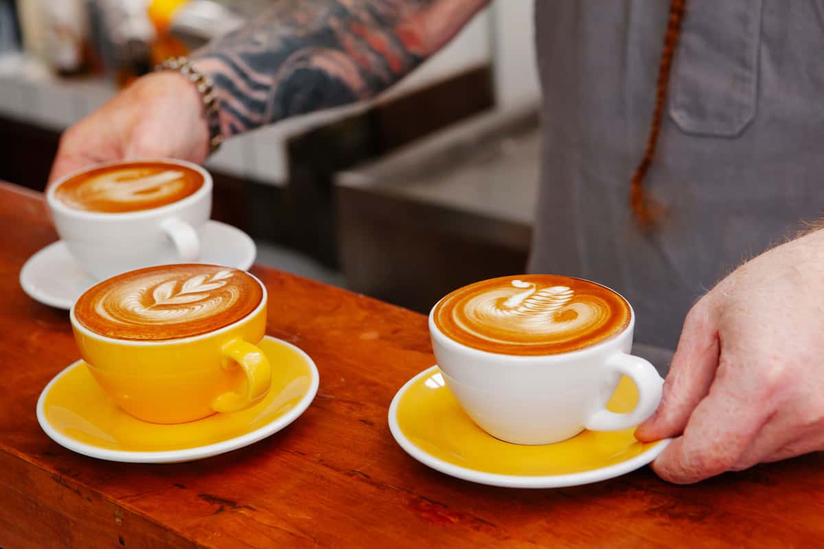 cafeteria worker serving coffee