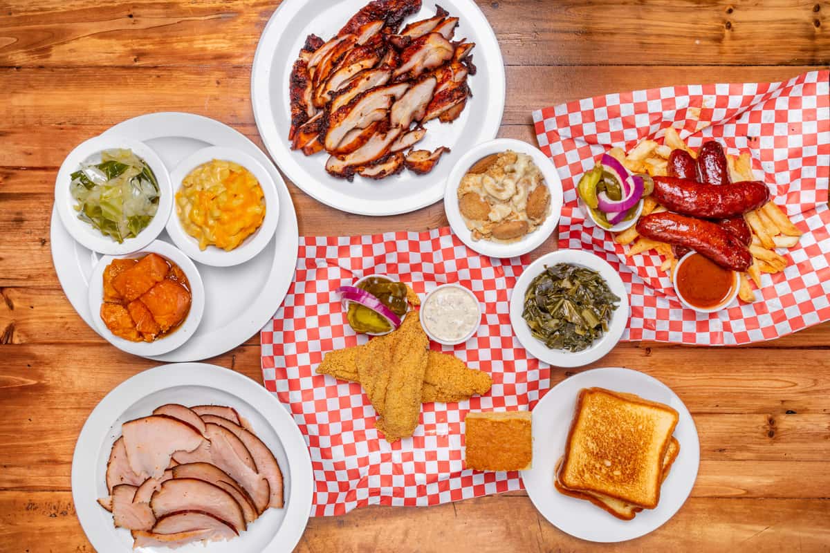 spread of dishes on checkered cloths top view