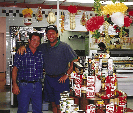 Two men taking a picture