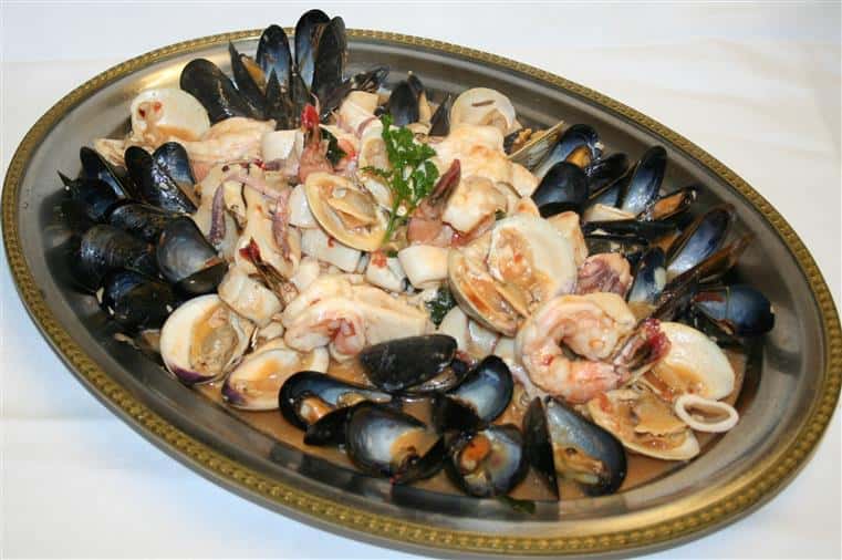 Mussels, clams, shrimp, calamari in large dish
