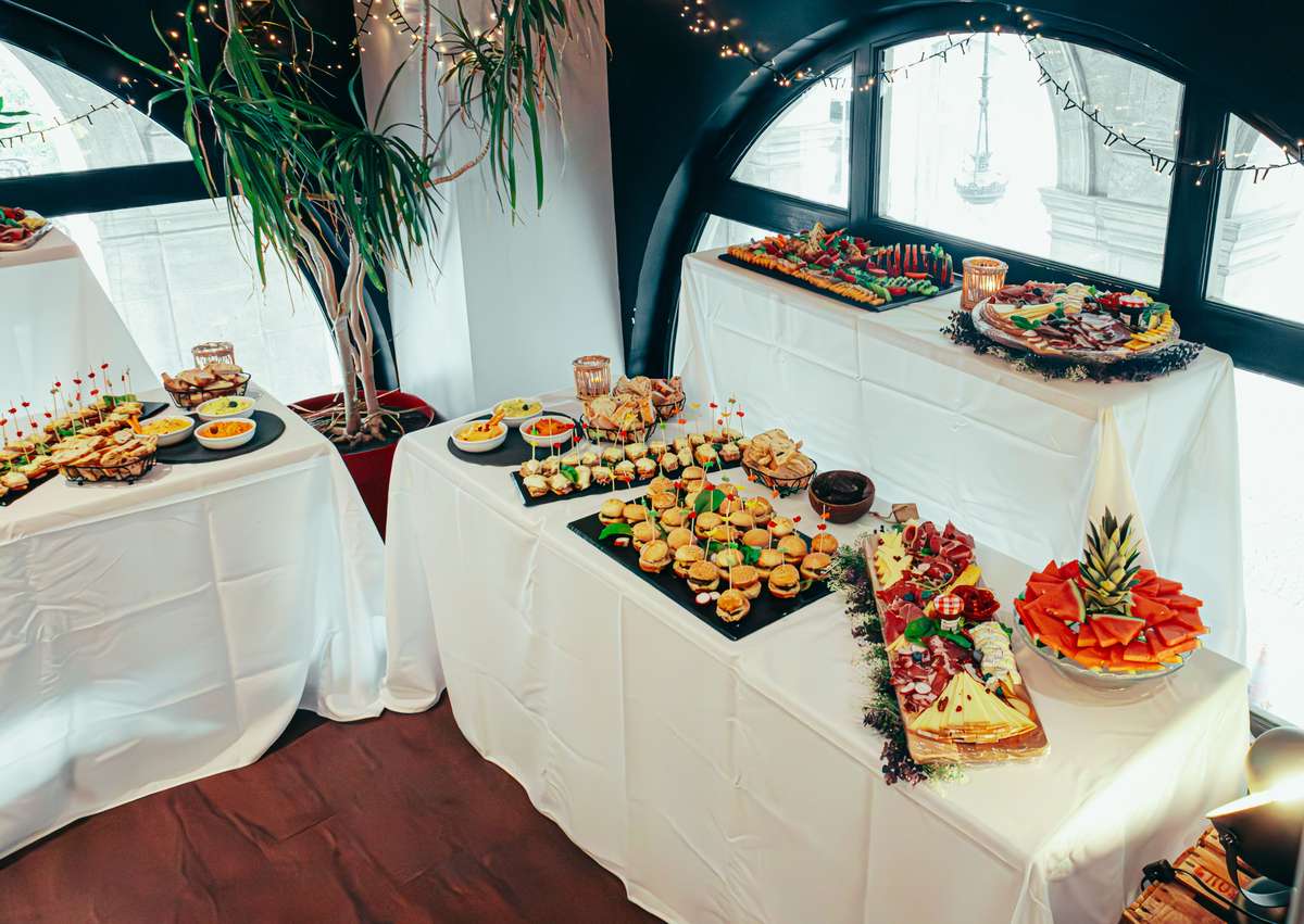 an-elegant-indoor-buffet-table-featuring-a-variety-of-appeti
