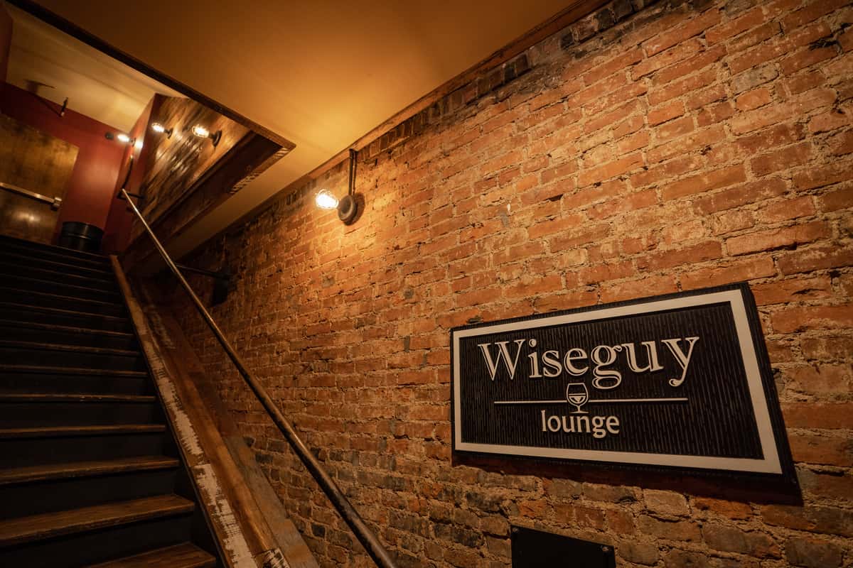 wiseguy sign in stairway