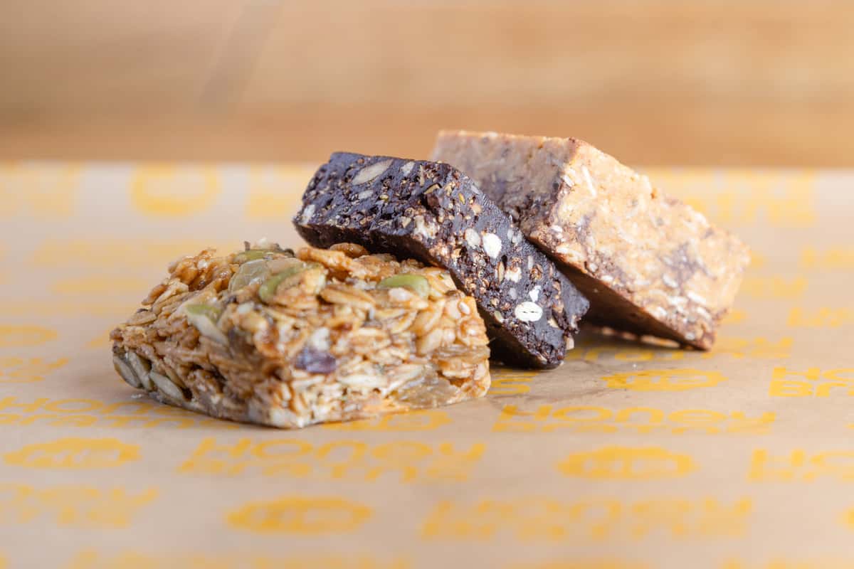 Assortment of house-made pastries, granola bars, and wholesome baked goods prepared fresh for café guests.