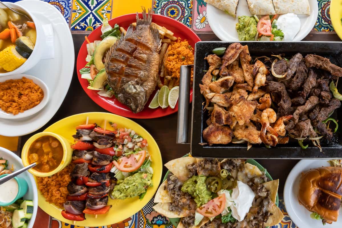 A variety of Mexican dishes on a table