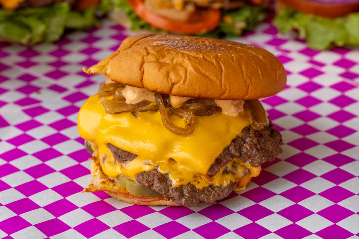 2 Wagyu smash patties, 2 slices melted American cheese, secret sauce, pickles and grilled onions all placed in between a potato bun