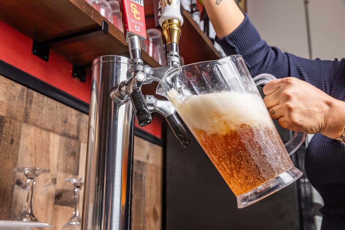 pouring beer on tap