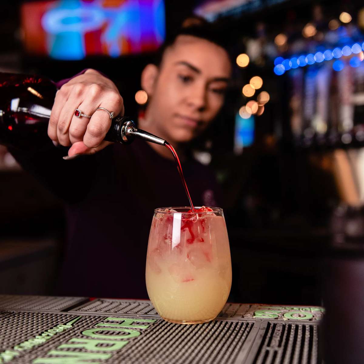 Bartender pouring a drink