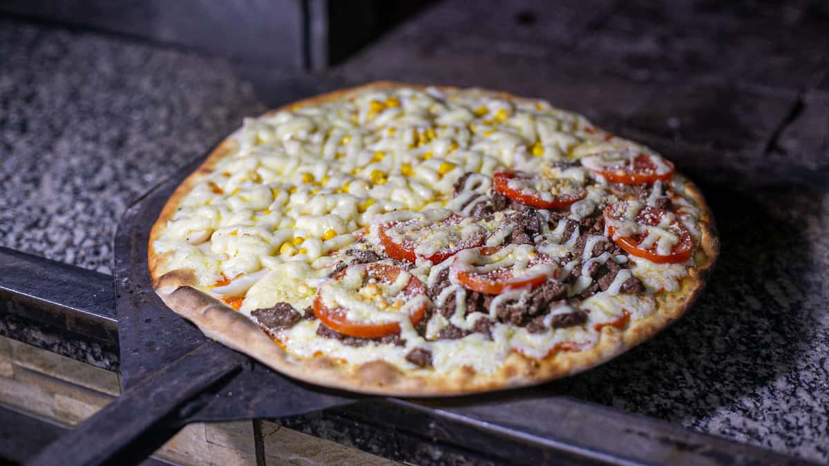 popmenu-freshly-baked-brazilian-pizza-with-diverse-toppings