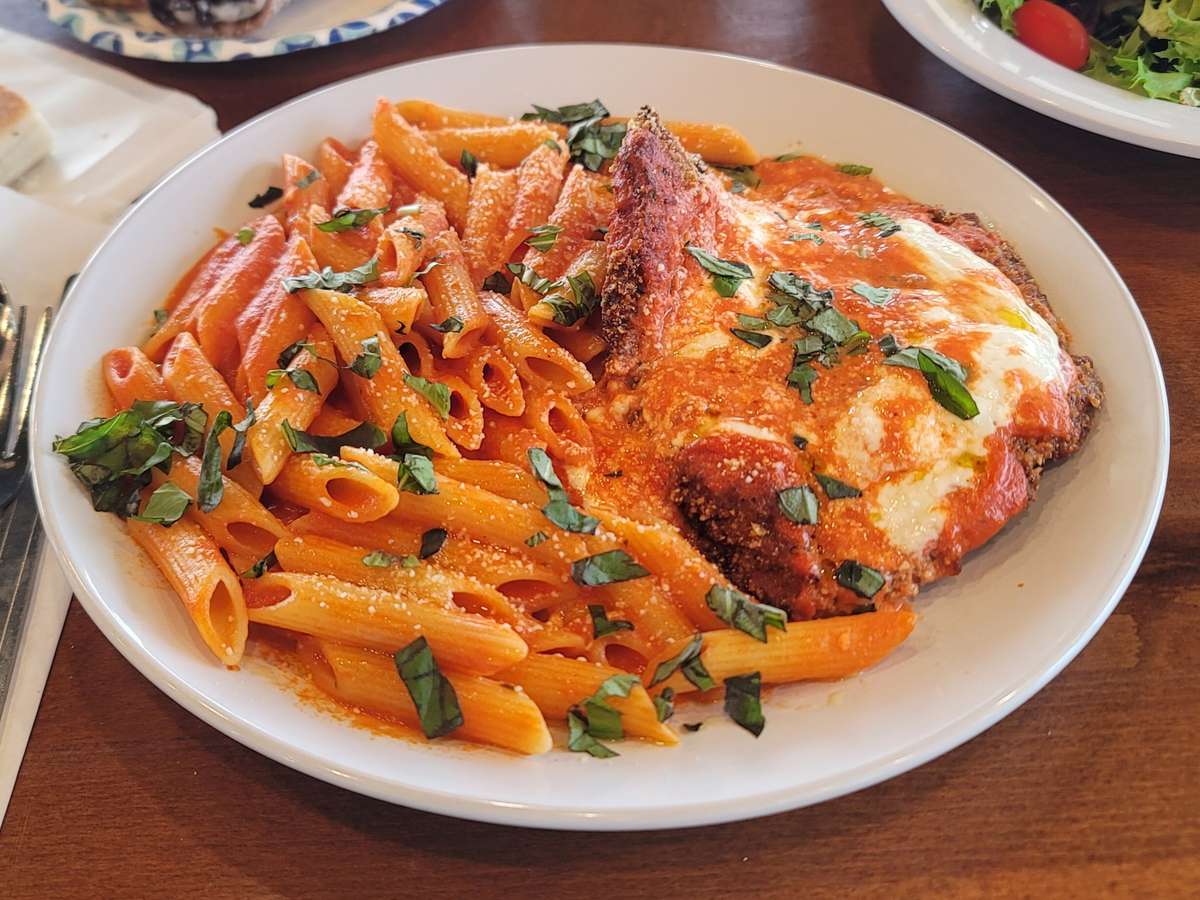Penne pasta tossed in our house made creamy vodka sauce. Coupled with fried chicken cutlets topped off with more sauce and Burrata