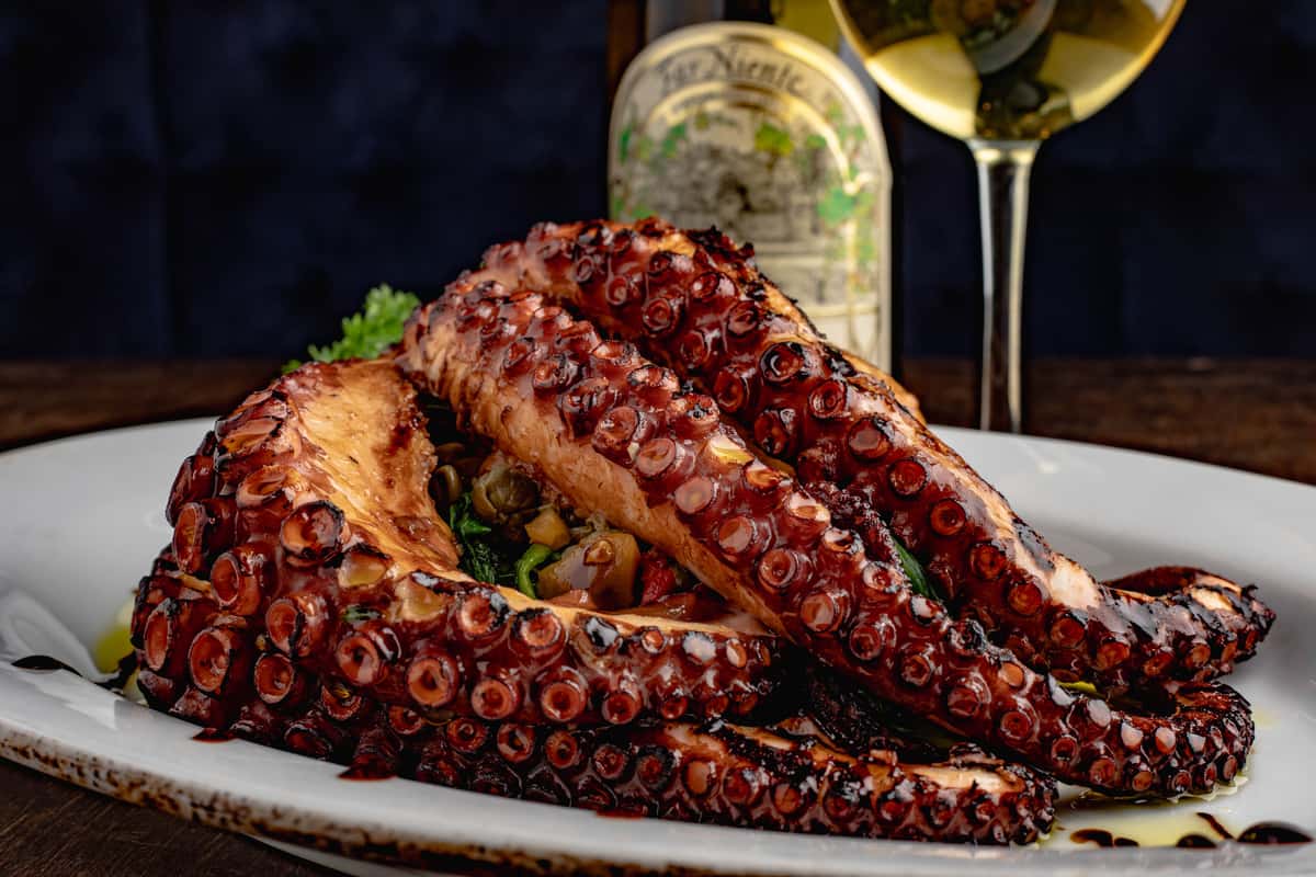 Grilled Octopus and Far Niente white wine at Empire Steak House
